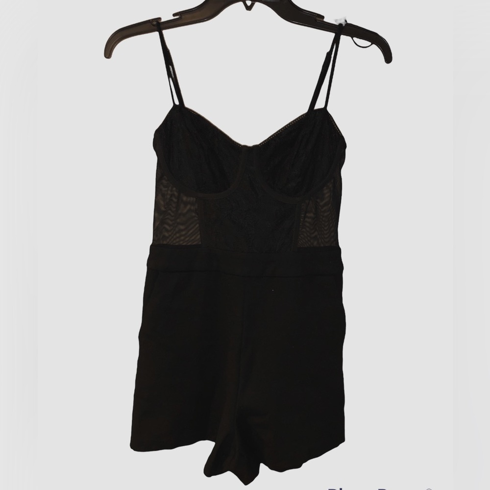 AMAZING CONDITION!!! NEVER USED!! Black laced romper with side pockets